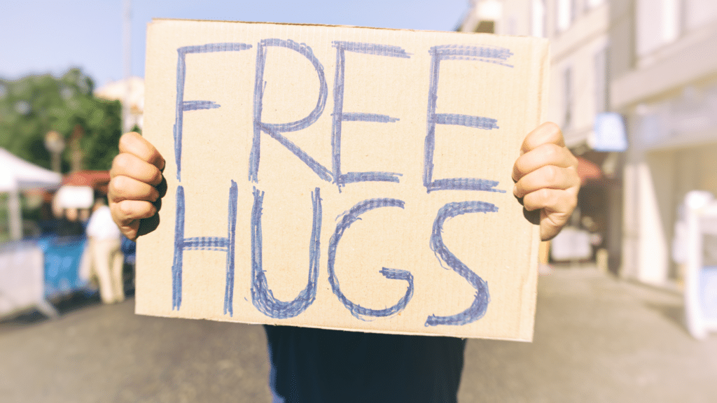 free-hugs-schild-mehr-berührung-mfl-blogartikel